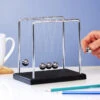 Funtime Newton's Cradle -Home Furnishings Store funtime et7540 newtons cradle lifestyle