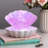 White Glitter Pearl Seashell Colour Changing Mood Light -Home Furnishings Store lesser and pavey lp49420 white seashell light 1